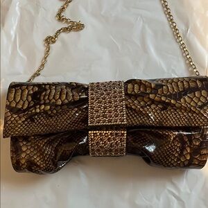Elegant Brown Snakeskin Clutch with Gold Chain